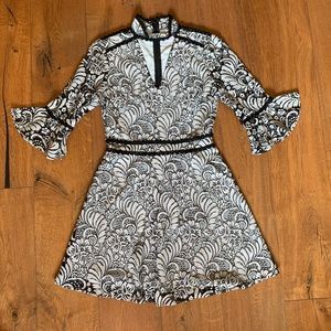 Black and gray lace dress with bell sleeve. New.